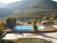 Piscine polyester, lac d'oro cailleboti teck de profil -  - piscine coque polyester